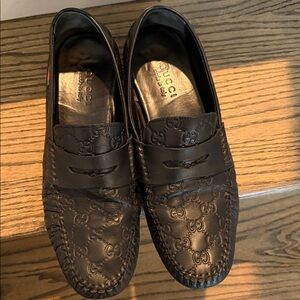 Gucci Men's Black GG Embossed Leather Penny Loafers